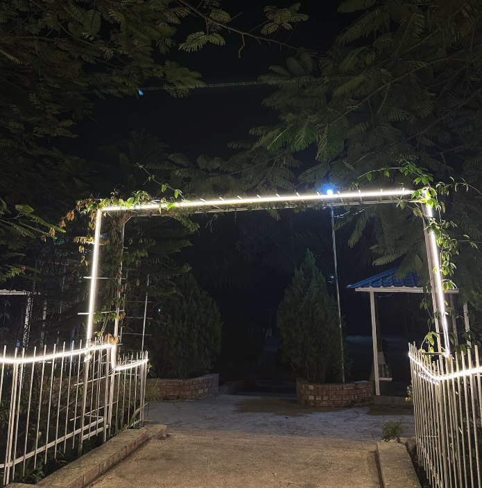 Resort entrance illuminated at night